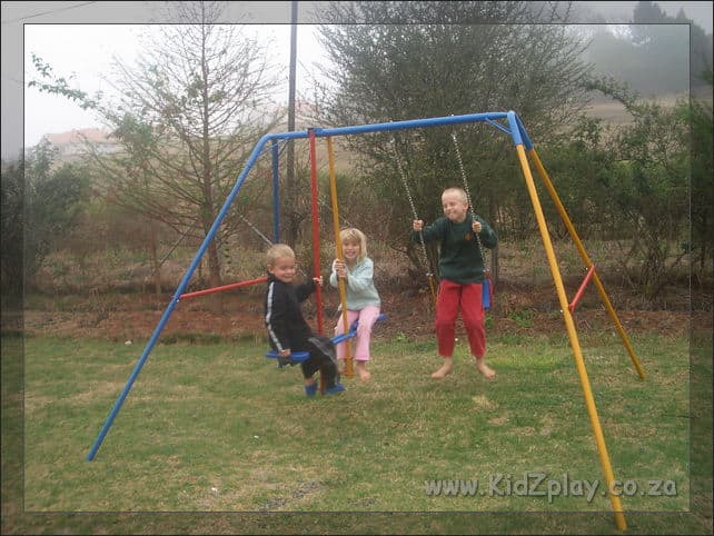KidZplay Preschool swing with wooden seat.